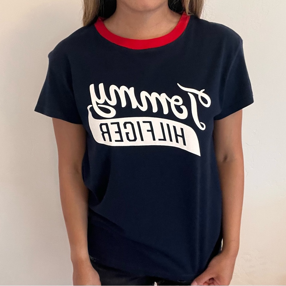 Navy blue with red collar Tommy Hilfiger tee. Size Small.